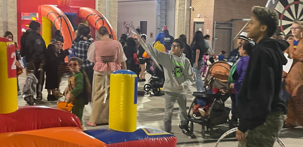 People playing carnival games
